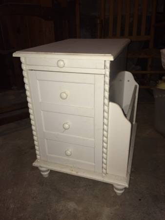 White cabinet and magazine rack