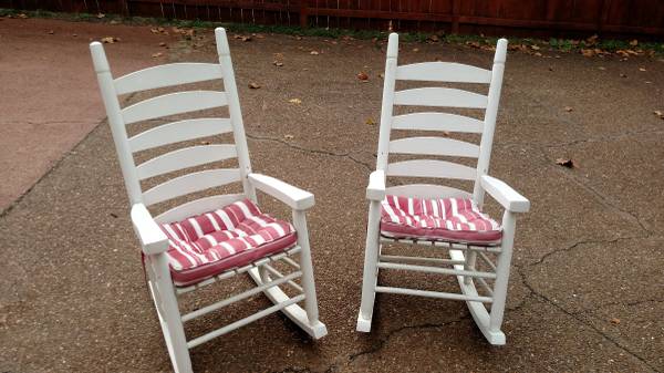 White wooden rocking chairs