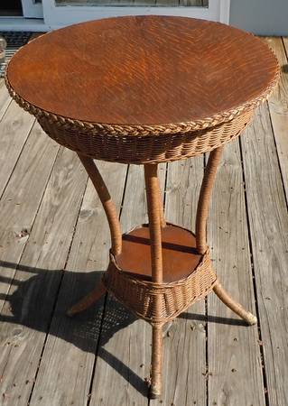 Wicker and quarter sawn oak lamp table signed by Karpen