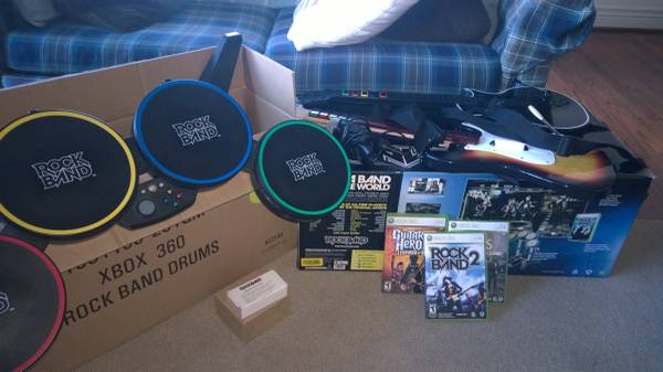 XBox 360 Rock Band drums, guitars microphone and 3 games