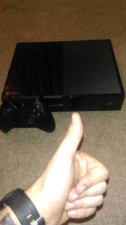 Xbox one with 2 games.