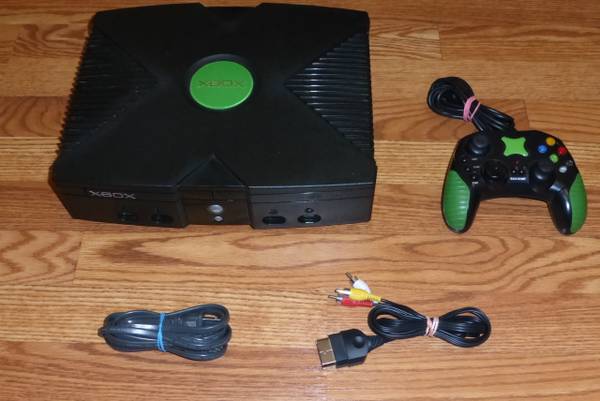 Xbox with 16 good games, price reduced (anchorage)